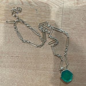 Kendra Scott Gold link necklace with emerald green stone.